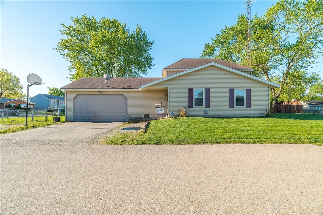220 Racer Street Troy, OH 45373 - Photo 12 of 33 This residence features an attached garage and a spacious yard.