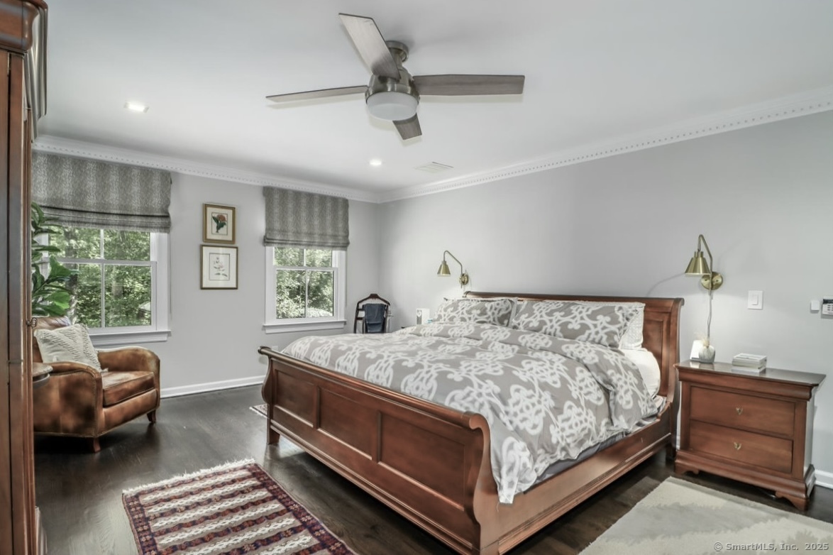 81 Graenest Ridge Road Wilton, CT 06897 - Photo 19 of 39 a bedroom with a bed and a couch