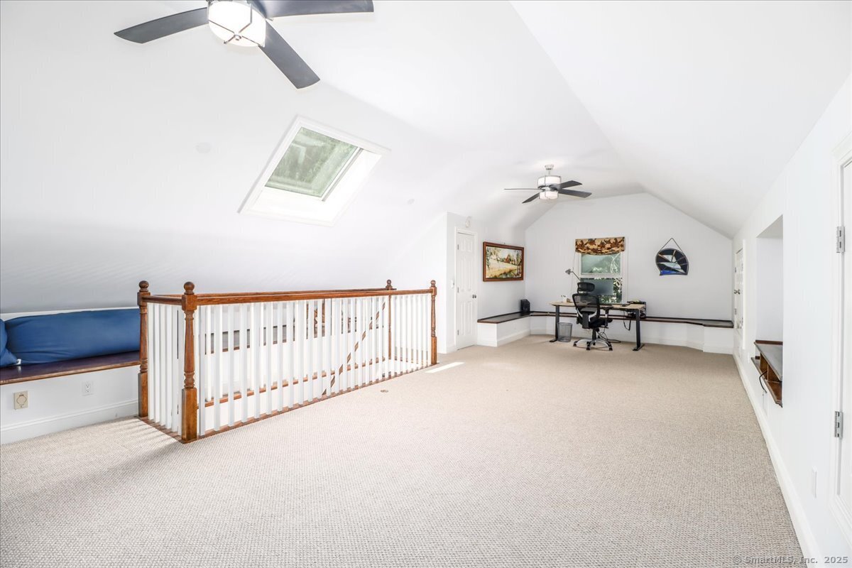 81 Graenest Ridge Road Wilton, CT 06897 - Photo 28 of 39 a view of livingroom with furniture and windows
