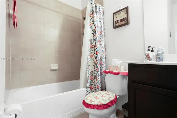 a bathroom with a sink and a shower