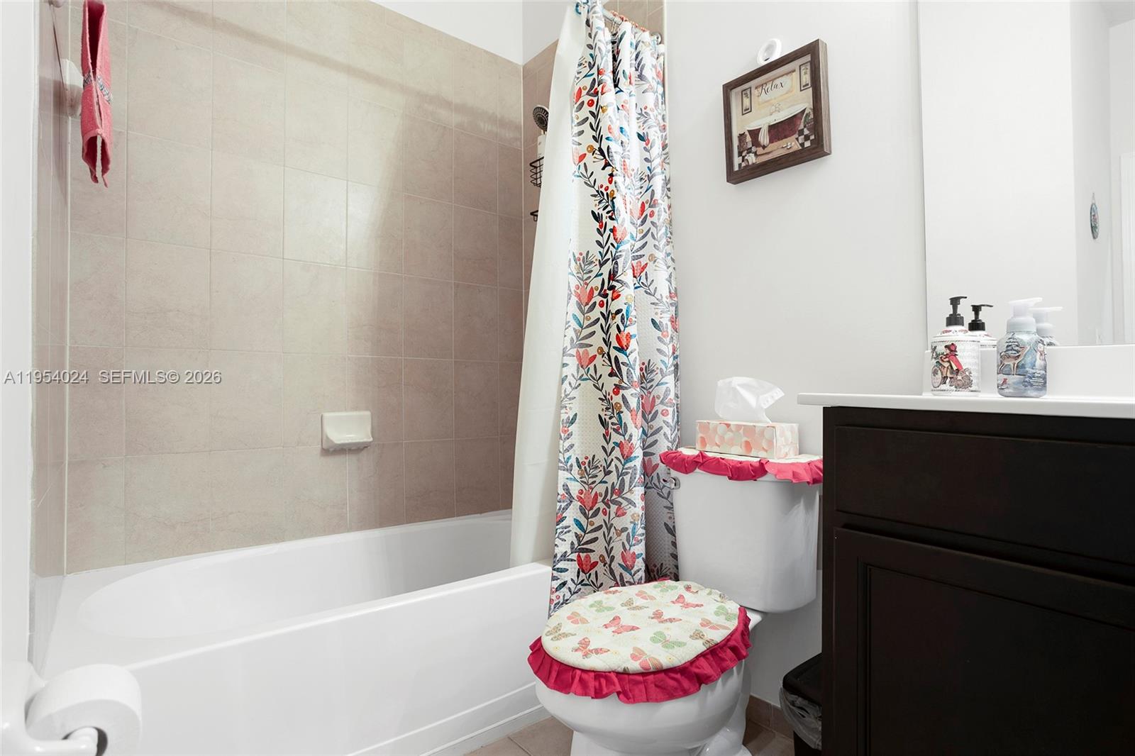 17149 Southwest 94th Street Miami, FL 33196 - Photo 27 of 36 a bathroom with a sink and a shower