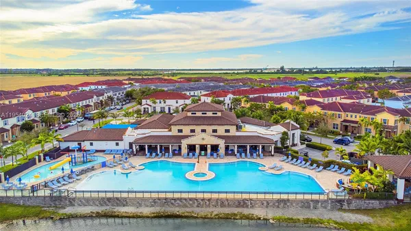 an aerial view of a house with a ocean view