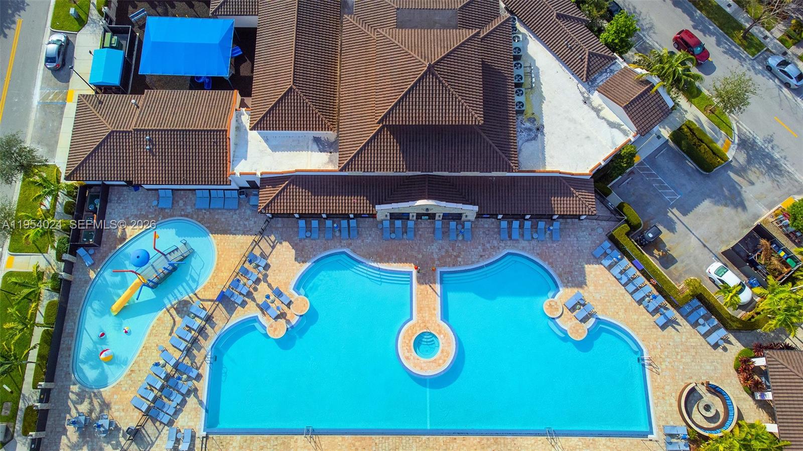 17149 Southwest 94th Street Miami, FL 33196 - Photo 6 of 36 an aerial view of a house with garden space and outdoor seating