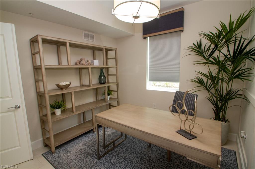 172 Indies Drive East, Unit 8102 Naples, FL 34114 - Photo 13 of 49 a view of a workspace with furniture