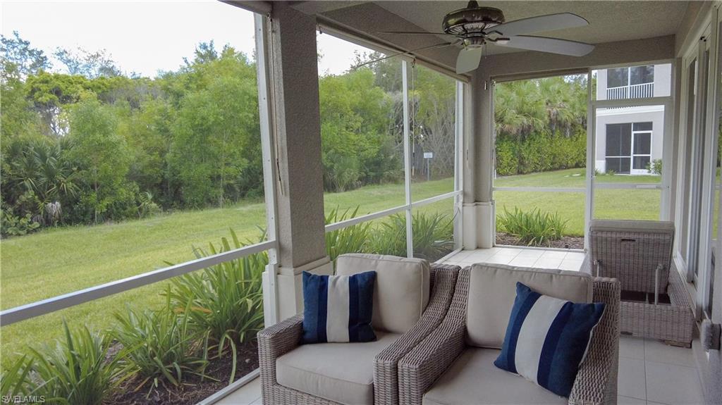 172 Indies Drive East, Unit 8102 Naples, FL 34114 - Photo 31 of 49 a balcony with furniture