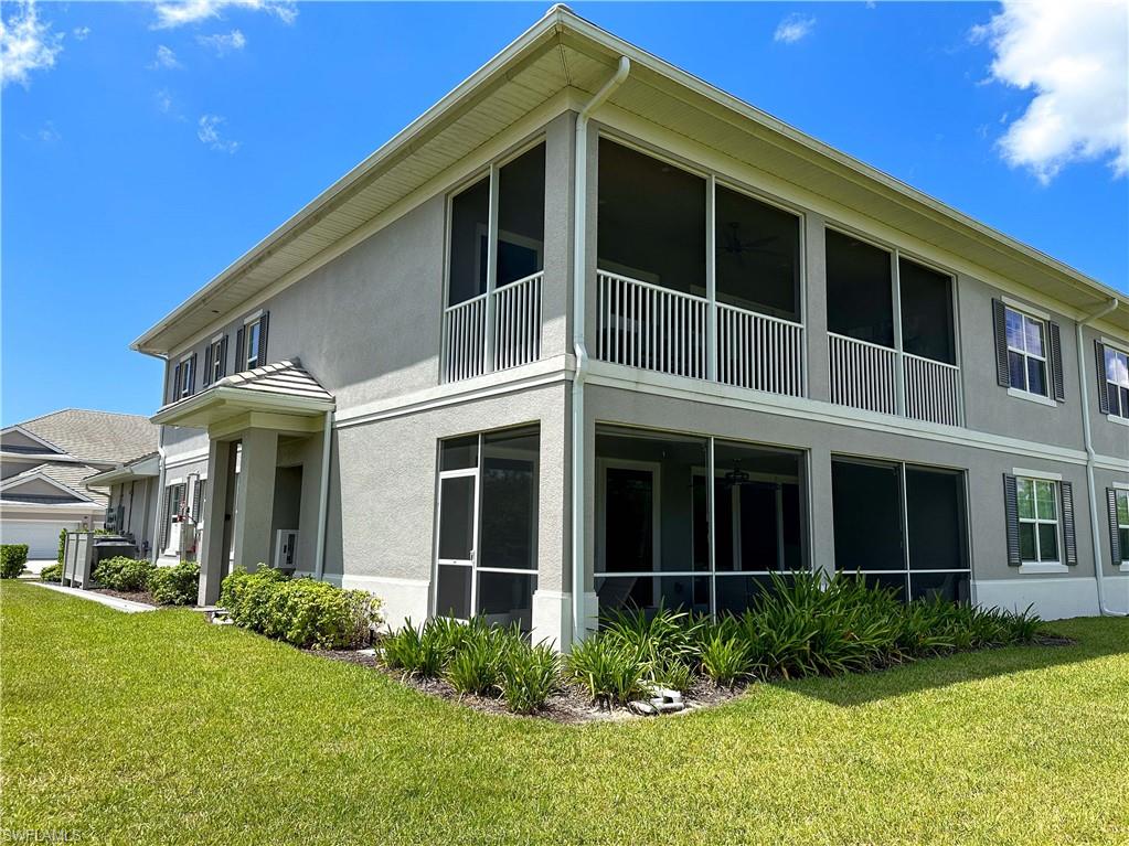 172 Indies Drive East, Unit 8102 Naples, FL 34114 - Photo 35 of 49 a view of a house with yard and plants