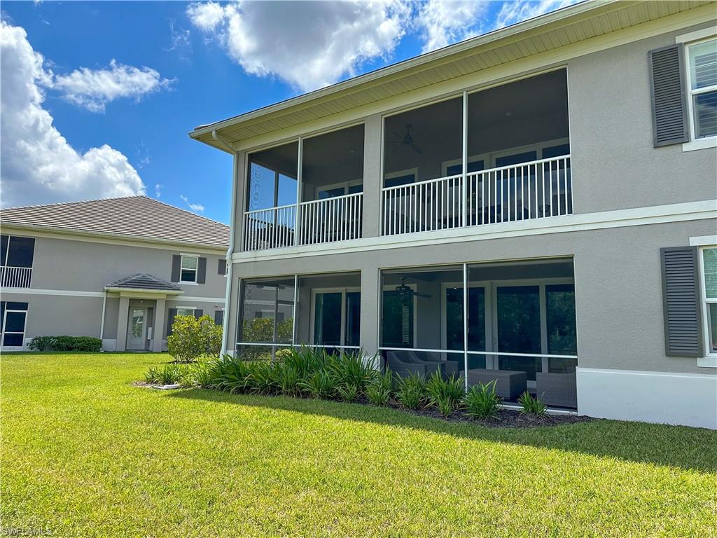 172 Indies Drive East, Unit 8102 Naples, FL 34114 - Photo 37 of 49 a house view with a garden space