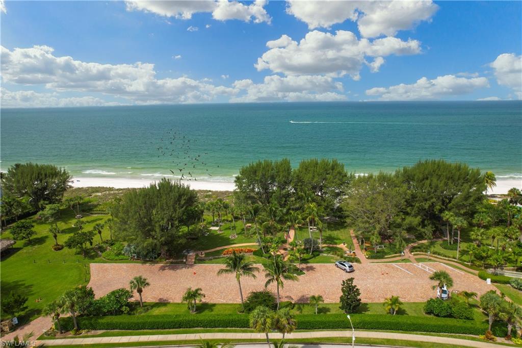 540 Rudder Road Naples, FL 34102 - Photo 12 of 37 Birds eye view of property with a water view and a beach view