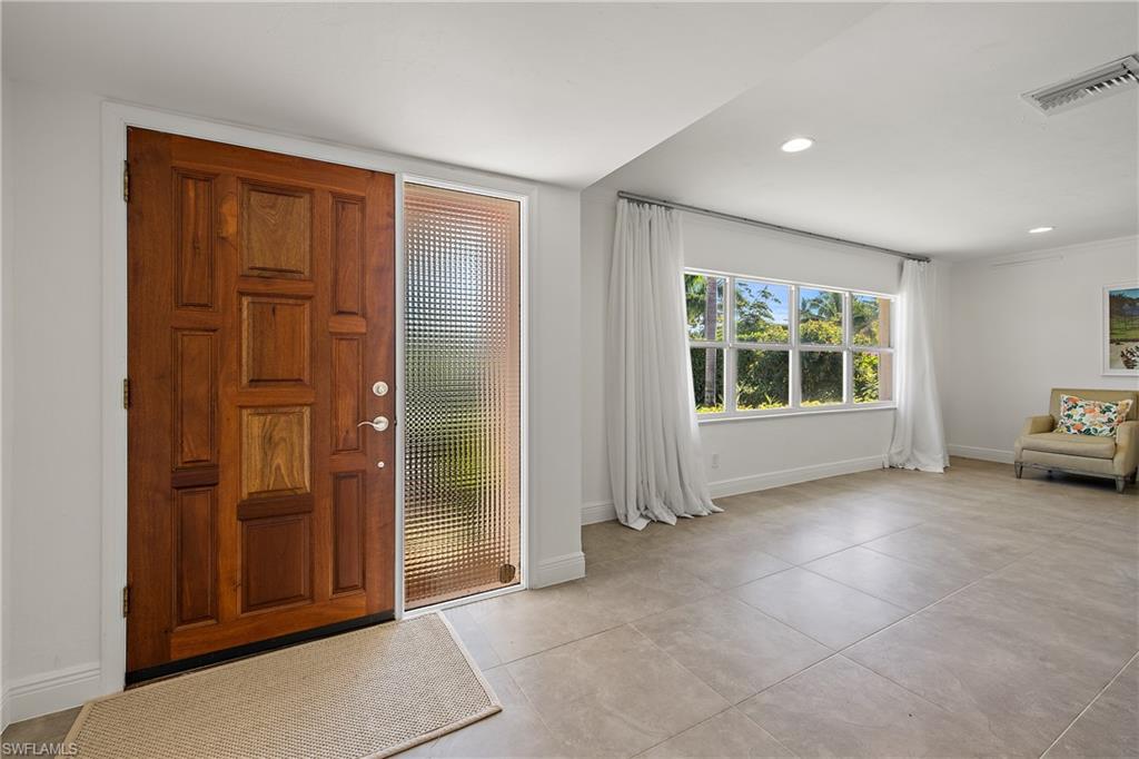 540 Rudder Road Naples, FL 34102 - Photo 15 of 37 Entrance foyer with recessed lighting, baseboards, light tile patterned flooring, and visible vents