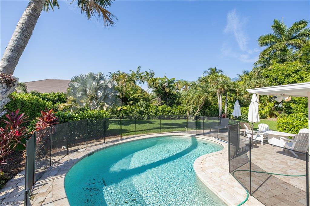 540 Rudder Road Naples, FL 34102 - Photo 3 of 37 View of pool featuring fence, a patio area, and a fenced in pool