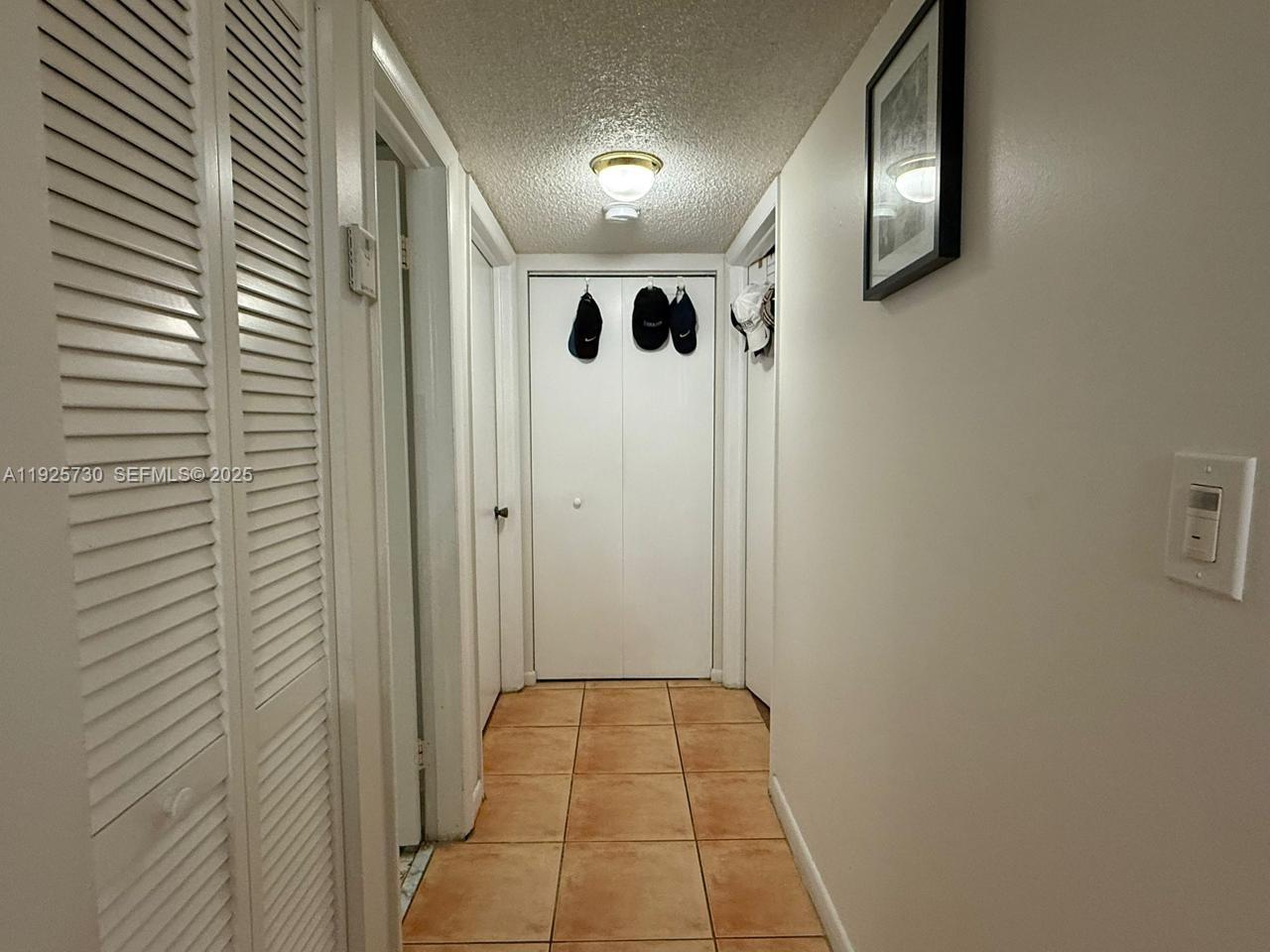 8600 Southwest 133rd Avenue Road, Unit 310 Miami, FL 33183 - Photo 8 of 22 a view of a hallway