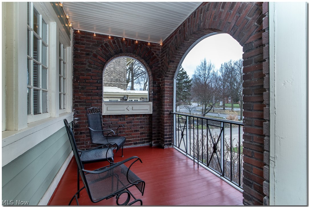 2825 Coventry Road Cleveland, OH 44120 - Photo 16 of 35 Enjoy the views, relatively bug free, while sitting on the screened in Side Porch