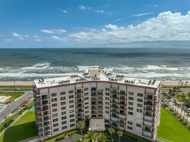 a view of building with ocean view