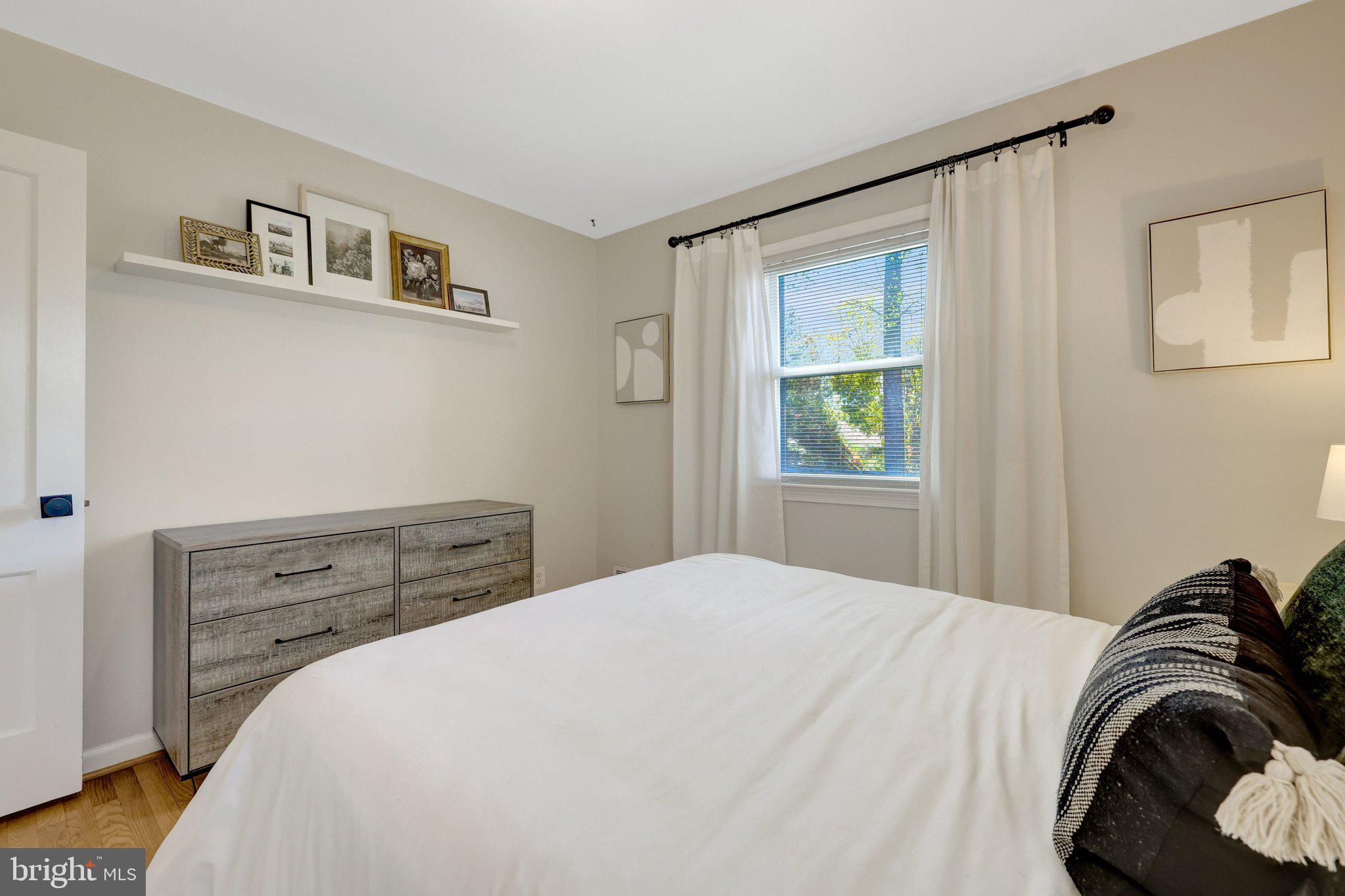 4132 Addison Road Fairfax, VA 22030 - Photo 27 of 58 a bedroom with a bed and a window