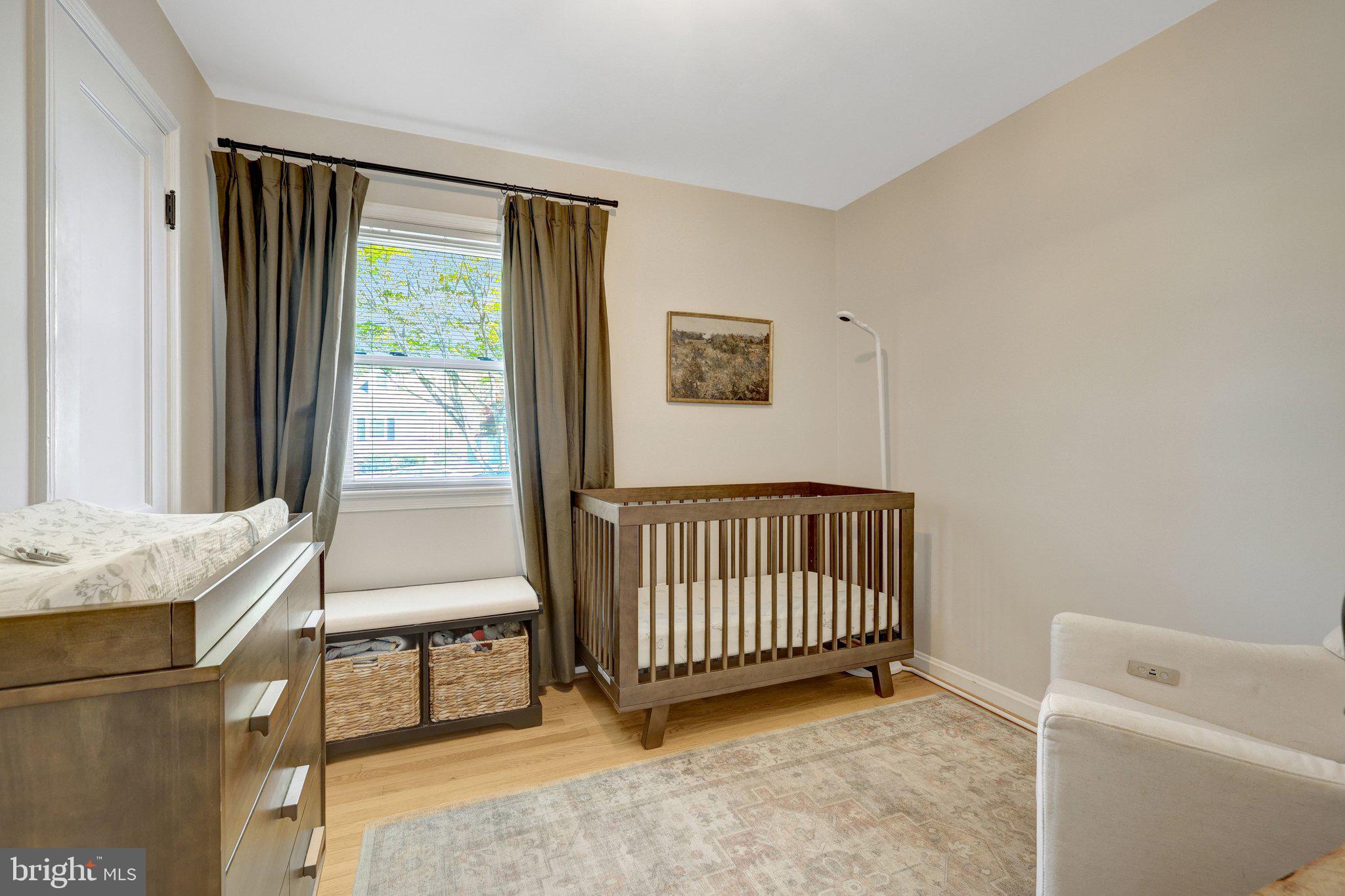 4132 Addison Road Fairfax, VA 22030 - Photo 31 of 58 a bedroom with a bed and a window