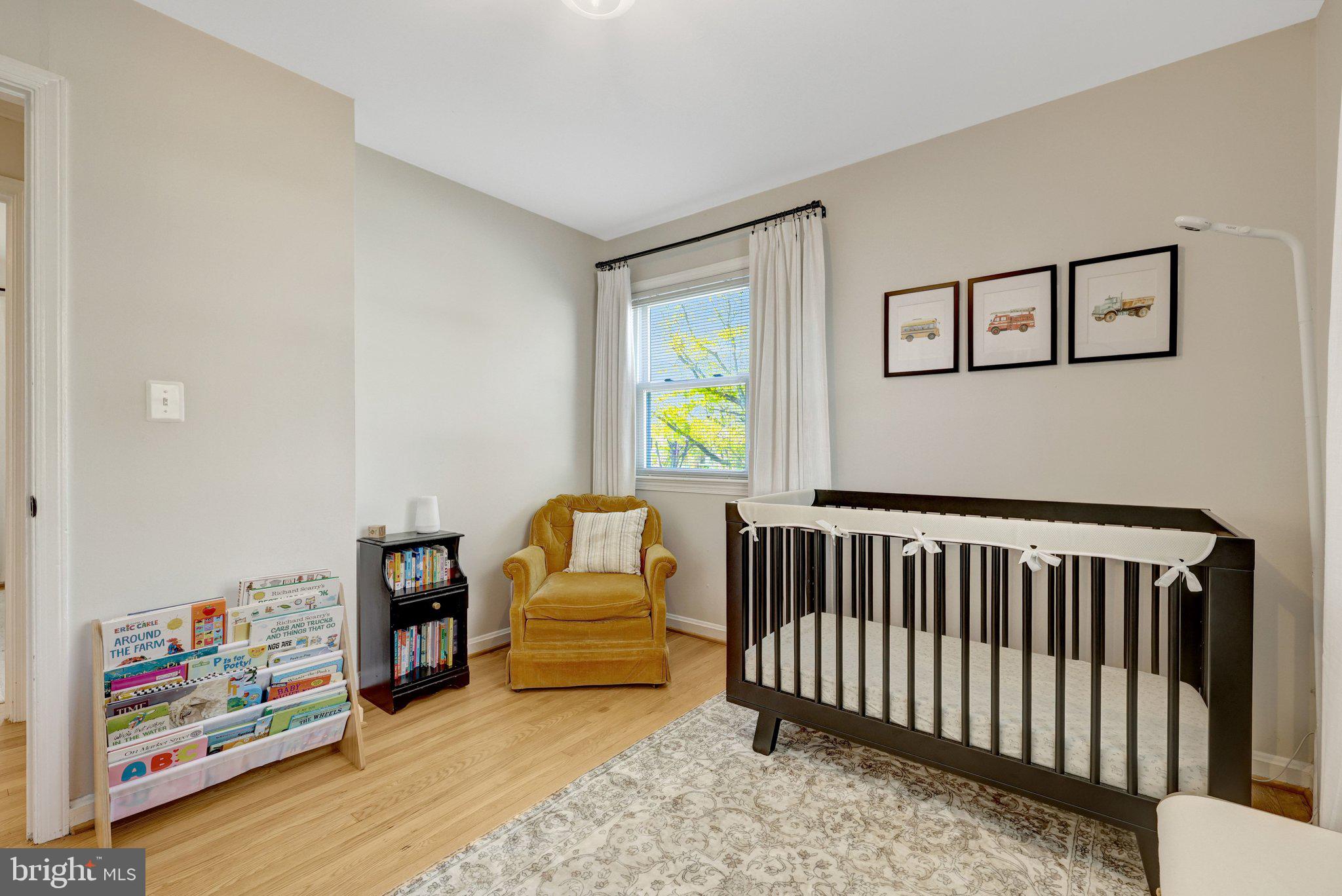 4132 Addison Road Fairfax, VA 22030 - Photo 34 of 58 a bedroom with furniture and a book shelf