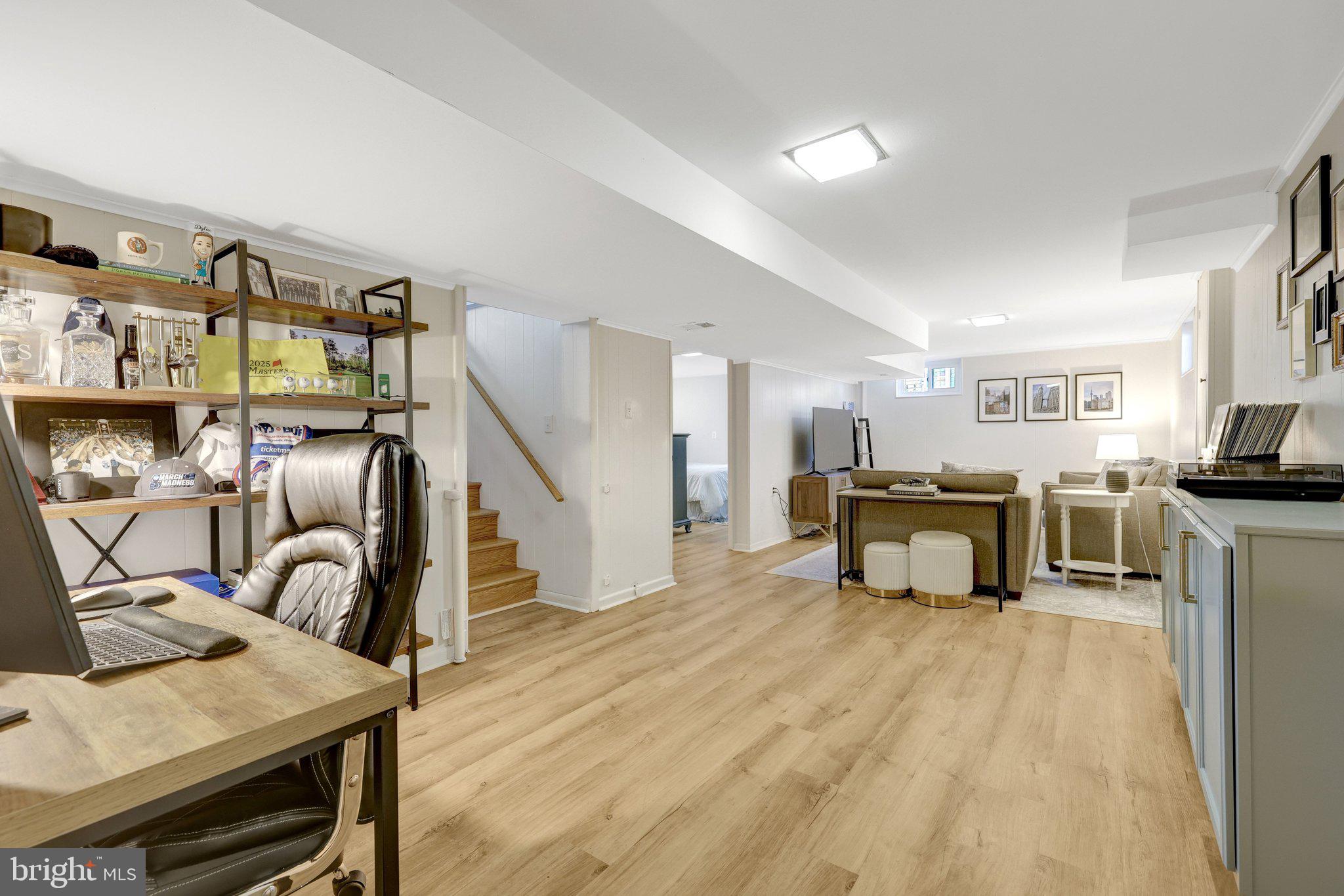 4132 Addison Road Fairfax, VA 22030 - Photo 39 of 58 a view of a kitchen with furniture and staircase