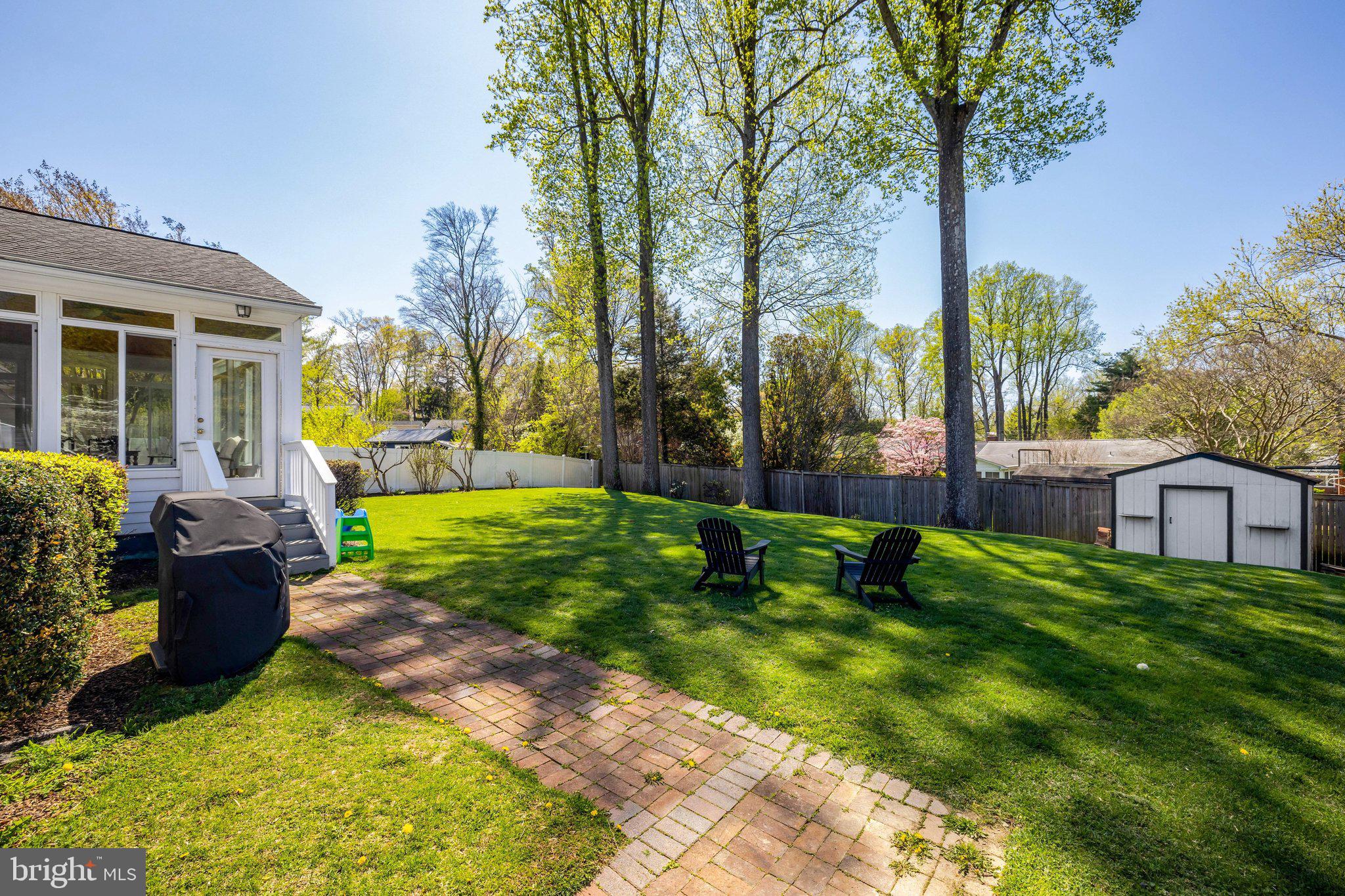 4132 Addison Road Fairfax, VA 22030 - Photo 45 of 58 a view of a house with backyard and sitting area