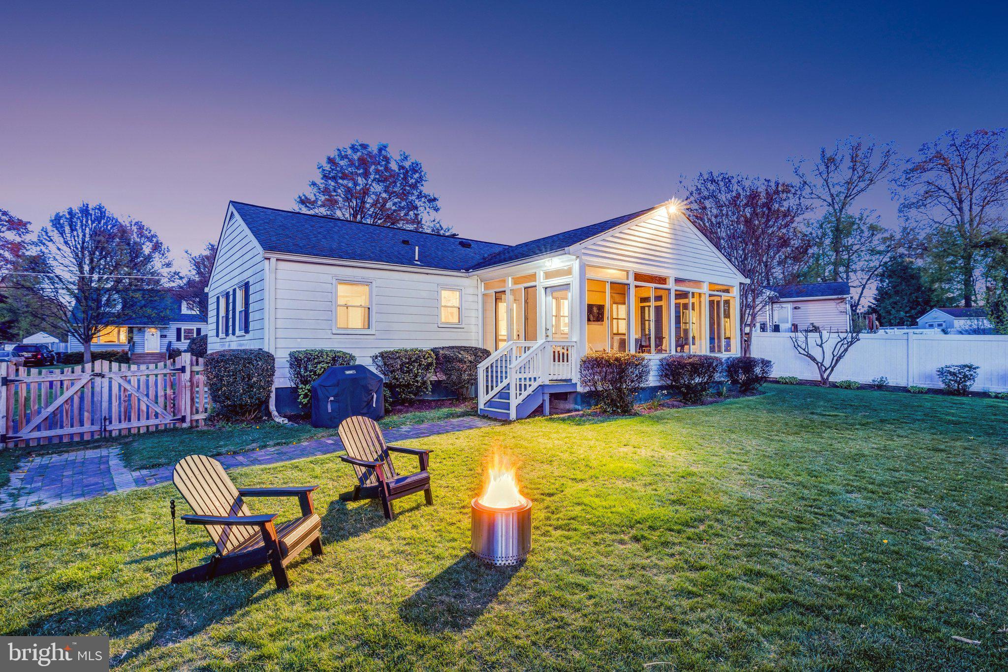 4132 Addison Road Fairfax, VA 22030 - Photo 5 of 58 a swimming pool with outdoor seating and yard