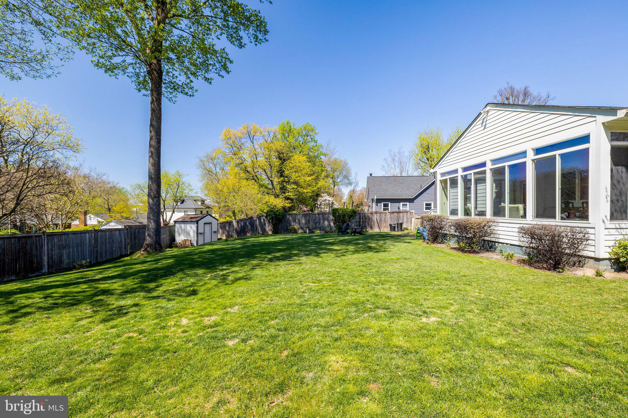 4132 Addison Road Fairfax, VA 22030 - Photo 53 of 58 a front view of house with yard and trees