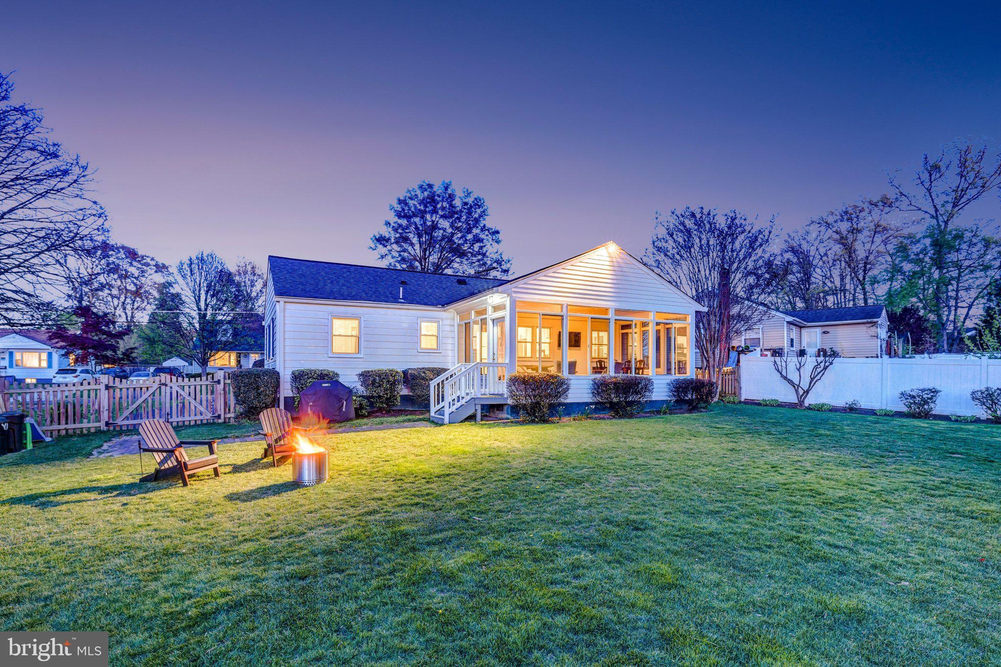 4132 Addison Road Fairfax, VA 22030 - Photo 56 of 58 a view of a house with a yard