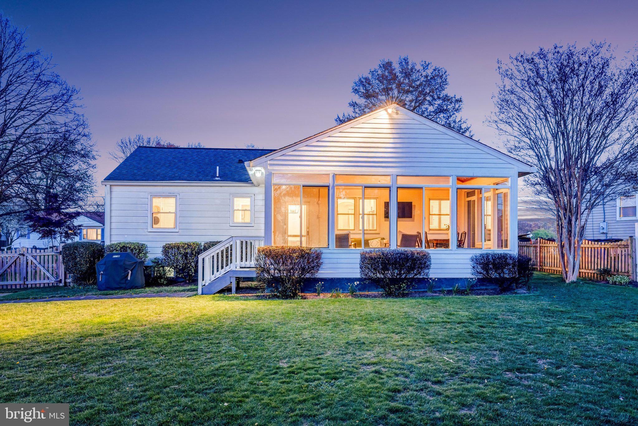 4132 Addison Road Fairfax, VA 22030 - Photo 57 of 58 a front view of house with yard and outdoor seating