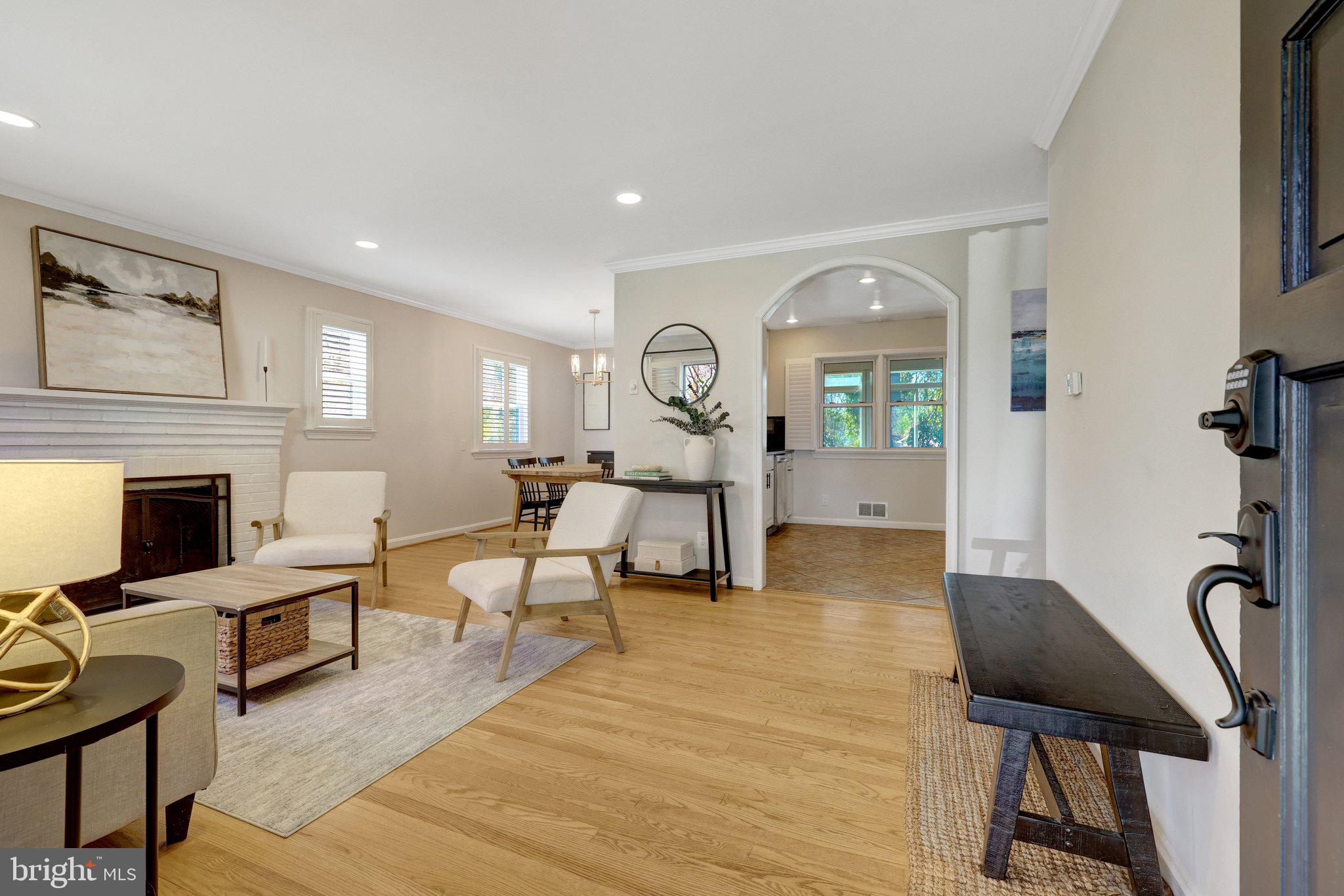 4132 Addison Road Fairfax, VA 22030 - Photo 8 of 58 a living room with furniture and a fireplace