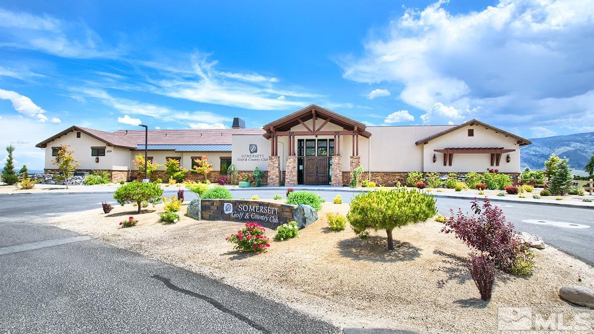 1633 Clover Hill Trail Reno, NV 89523 - Photo 11 of 37 a front view of a house with a yard and potted plants