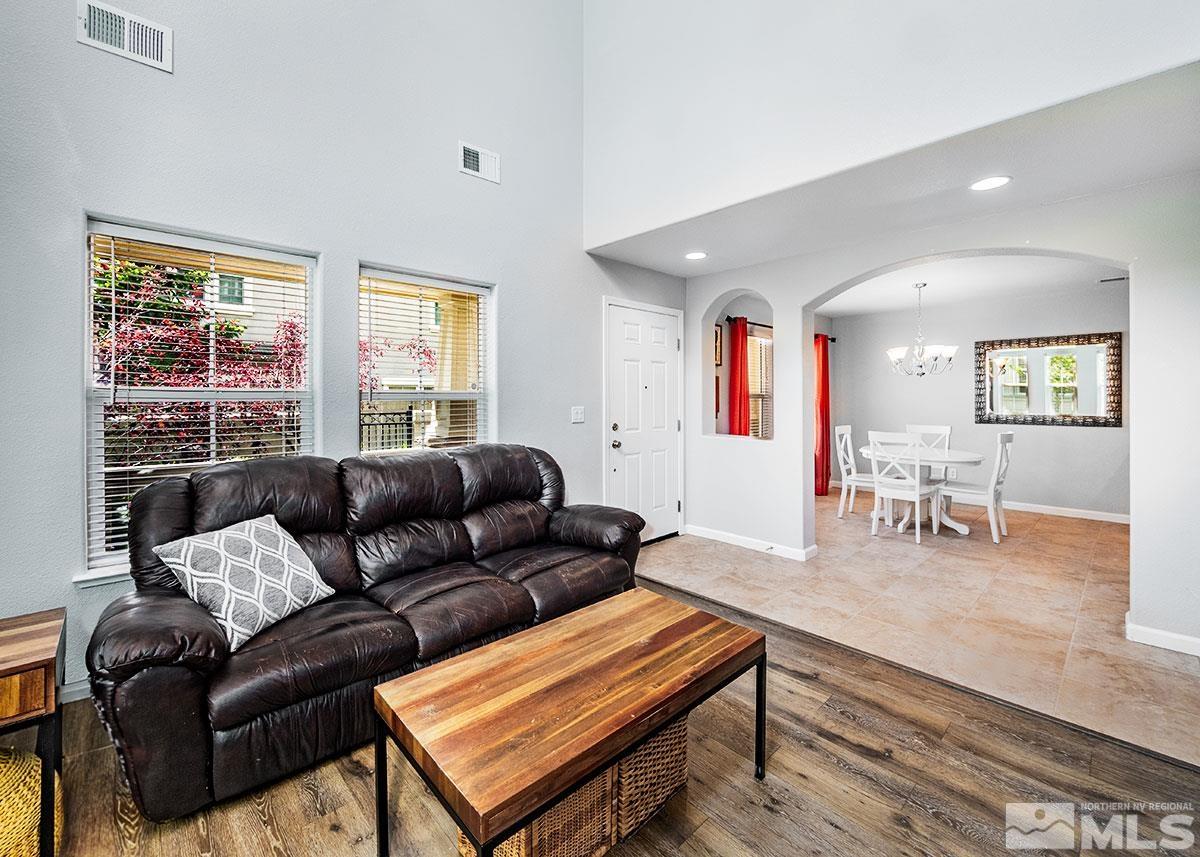 1633 Clover Hill Trail Reno, NV 89523 - Photo 5 of 37 a living room with furniture and a wooden floor