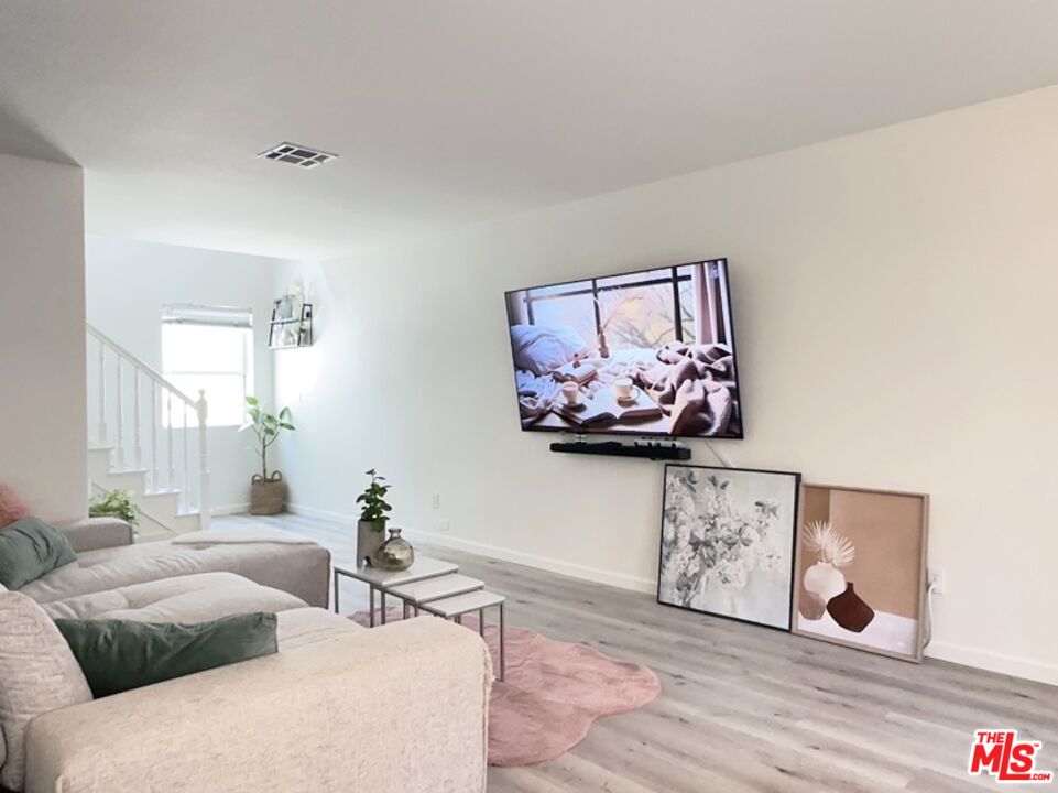 7864 Stewart And Gray Road Downey, CA 90241 - Photo 1 of 25 a living room with furniture
