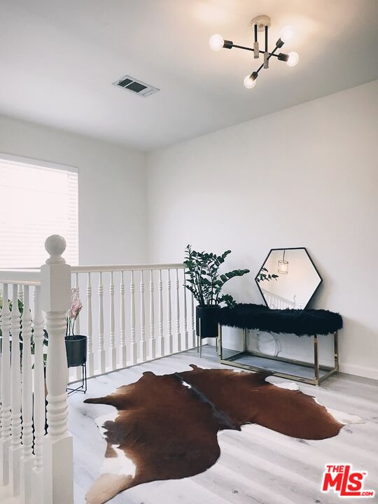 7864 Stewart And Gray Road Downey, CA 90241 - Photo 18 of 25 a view of a livingroom with furniture and wooden floor