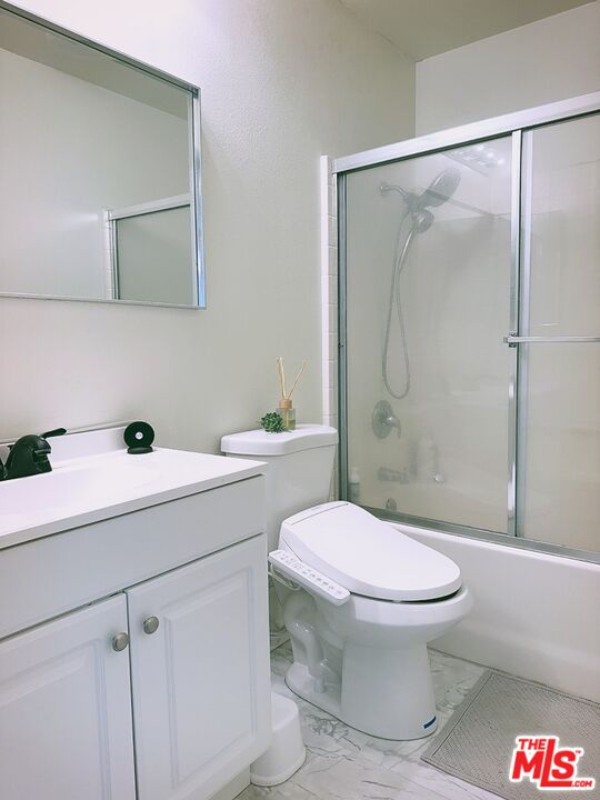 7864 Stewart And Gray Road Downey, CA 90241 - Photo 20 of 25 a bathroom with a sink toilet and shower
