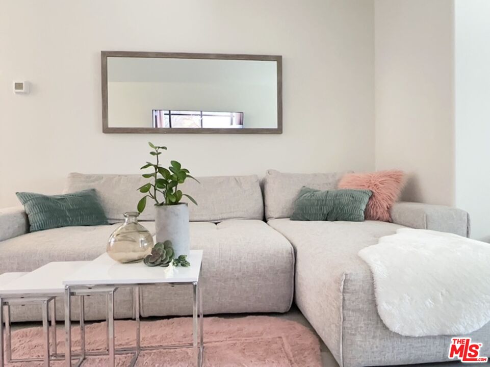 7864 Stewart And Gray Road Downey, CA 90241 - Photo 3 of 25 a living room with furniture