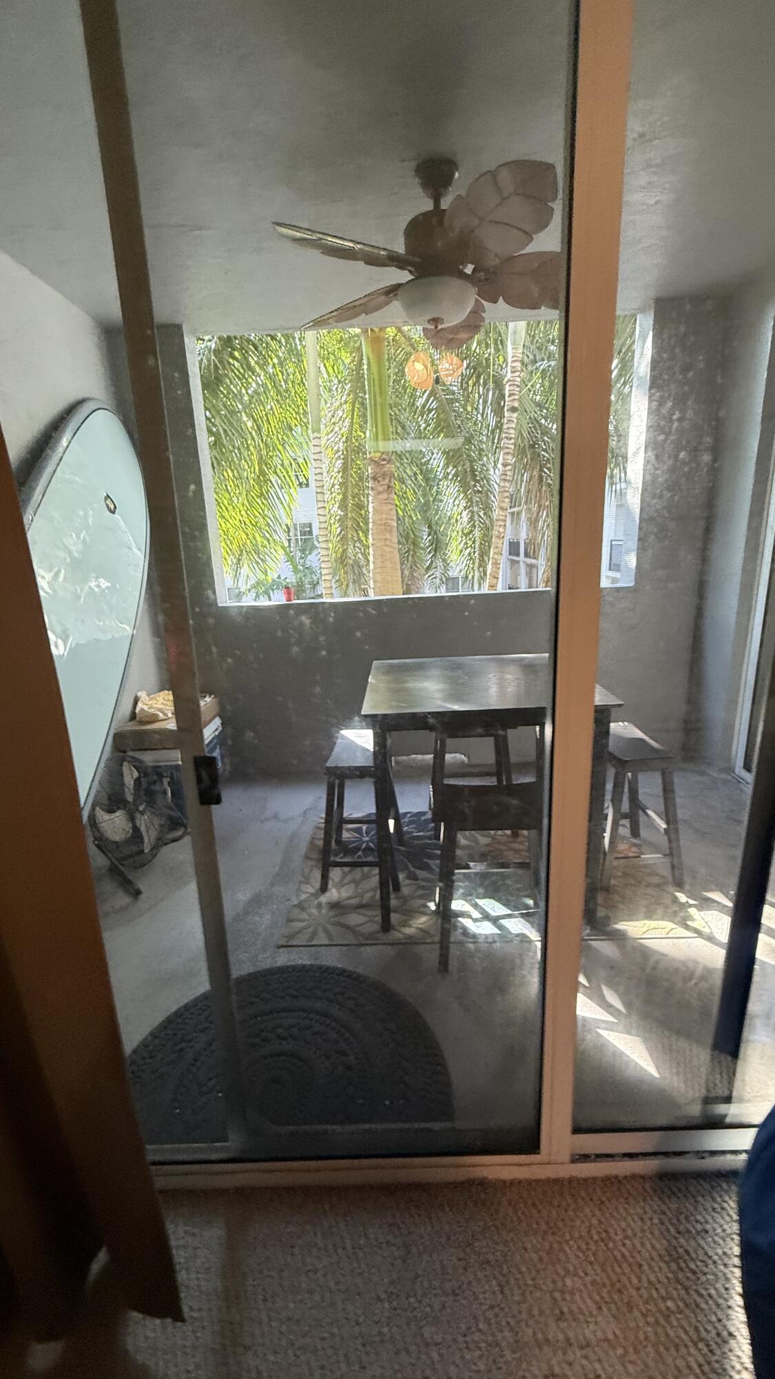 1690 Renaissance Commons Boulevard, Unit 1427 Boynton Beach, FL 33426 - Photo 12 of 20 a view of living room with furniture and a large window