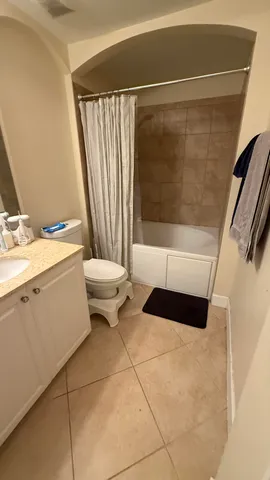 a bathroom with a bathtub and a sink