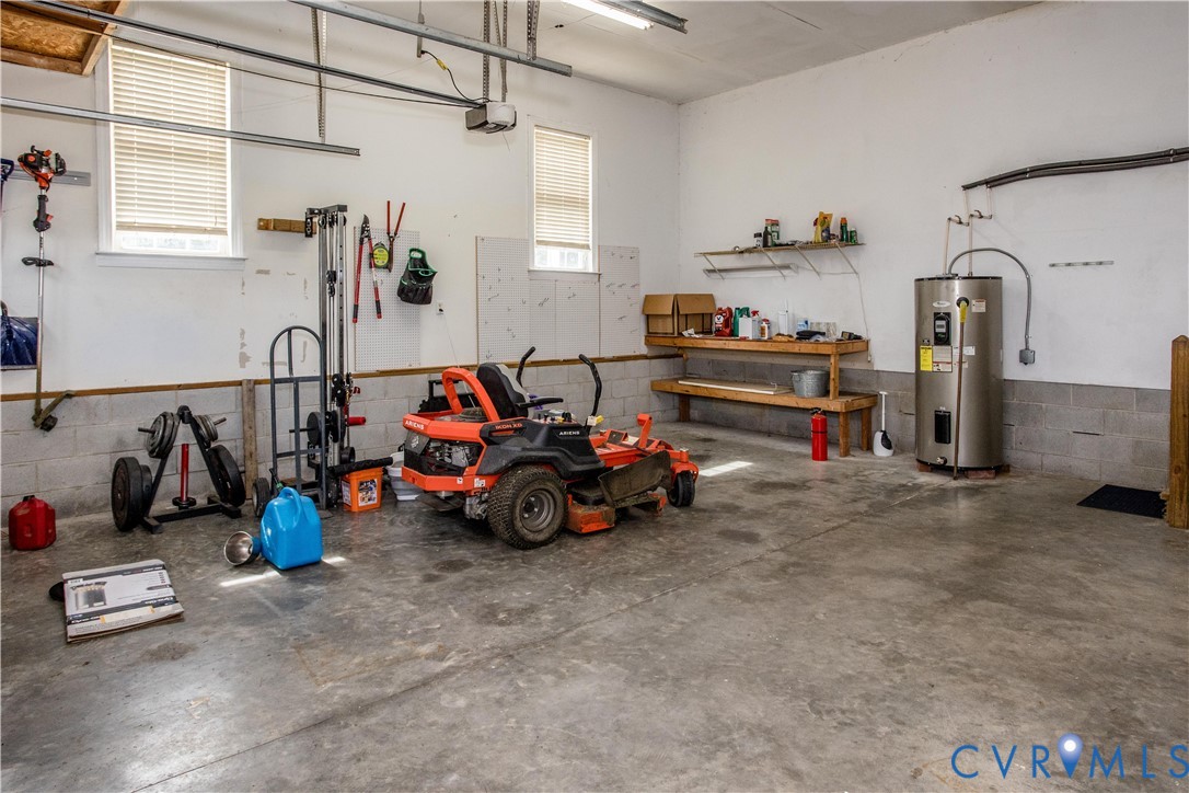 20411 Horseshoe Road Carson, VA 23830 - Photo 16 of 35 Spacious garage with concrete flooring, two window