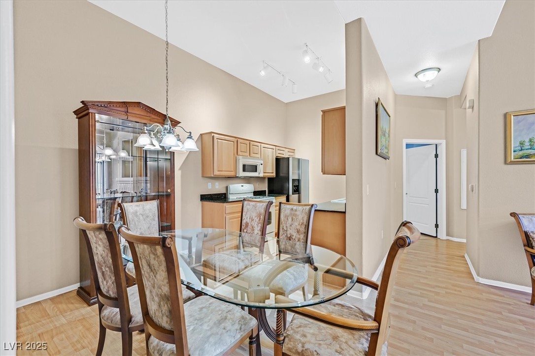 8805 Jeffreys Street, Unit 1088 Las Vegas, NV 89123 - Photo 4 of 12 Dining space adjoining kitchen and living areas.