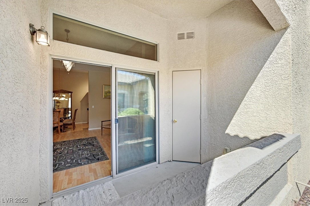 8805 Jeffreys Street, Unit 1088 Las Vegas, NV 89123 - Photo 9 of 12 Patio off living area at the front of condo.