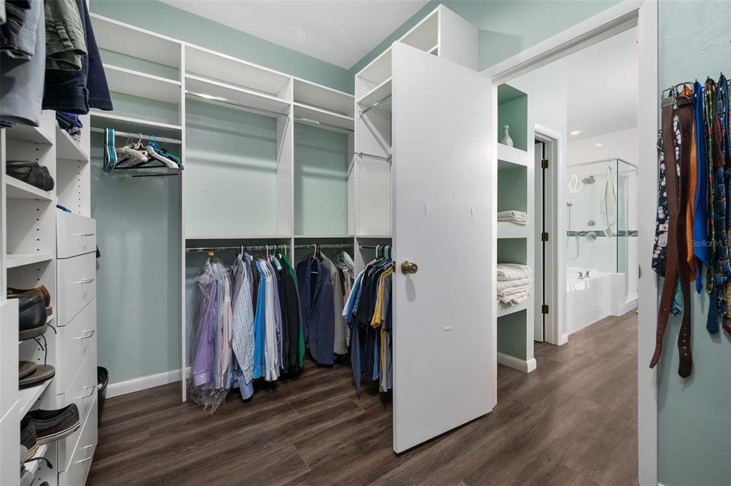 9923 Southwest 2nd Place Gainesville, FL 32607 - Photo 33 of 73 a view of walk in closet with clothes