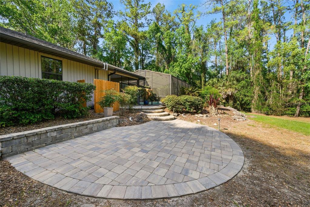 9923 Southwest 2nd Place Gainesville, FL 32607 - Photo 61 of 73 a view of a house with backyard and garden