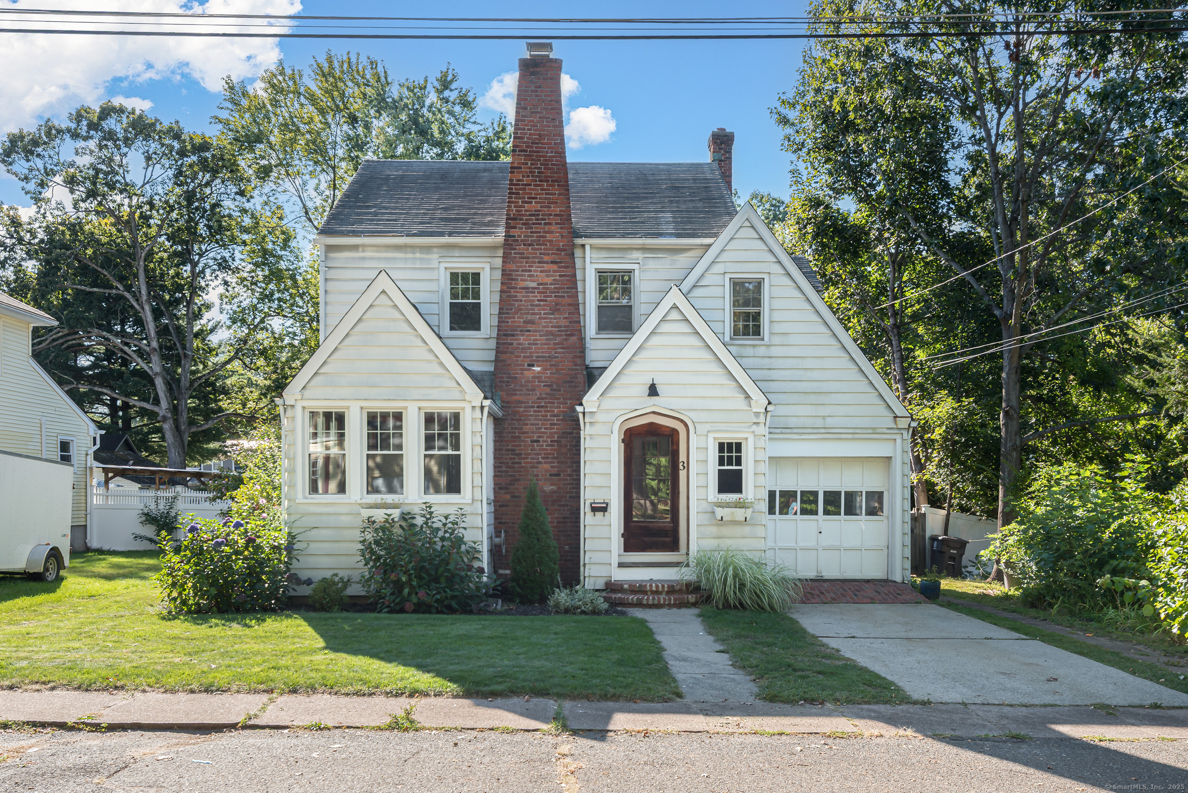 3 Martin Terrace Enfield, CT 06082 - Photo 1 of 1 a front view of a house with a yard