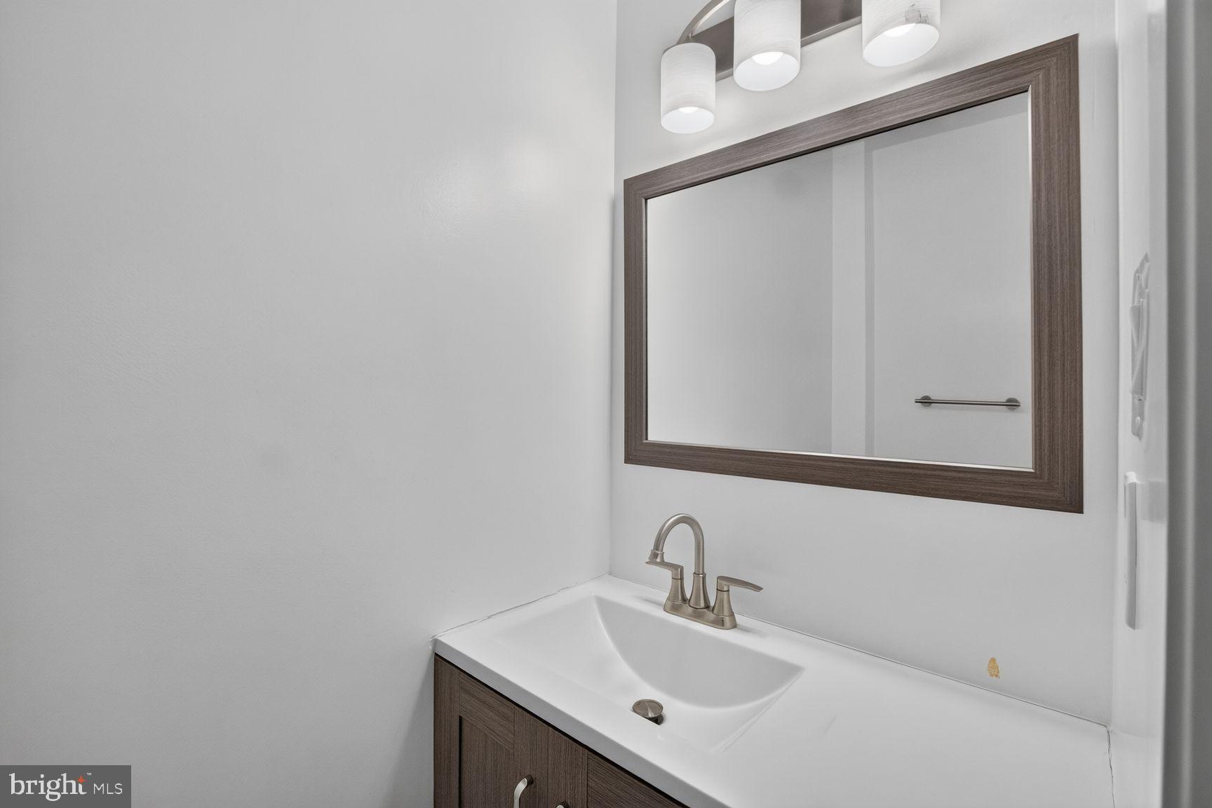 14620 Tynewick Terrace, Unit 2 Silver Spring, MD 20906 - Photo 12 of 30 Main FLoor Powder Room