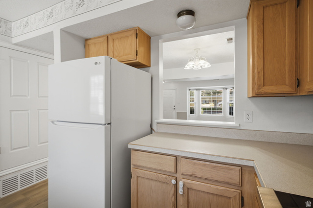 794 East 950 S Street Provo, UT 84606 - Photo 10 of 28 Kitchen pass-through window opening to an adjacent room