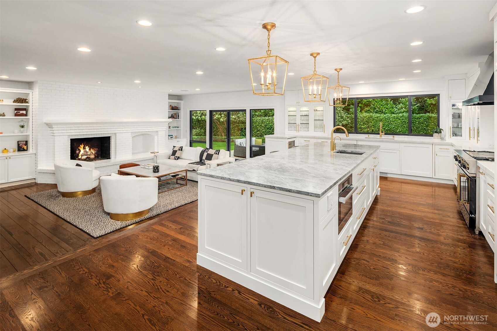 1601 Evergreen Point Road Medina, WA 98039 - Photo 13 of 40 a kitchen with a sink stove and cabinets