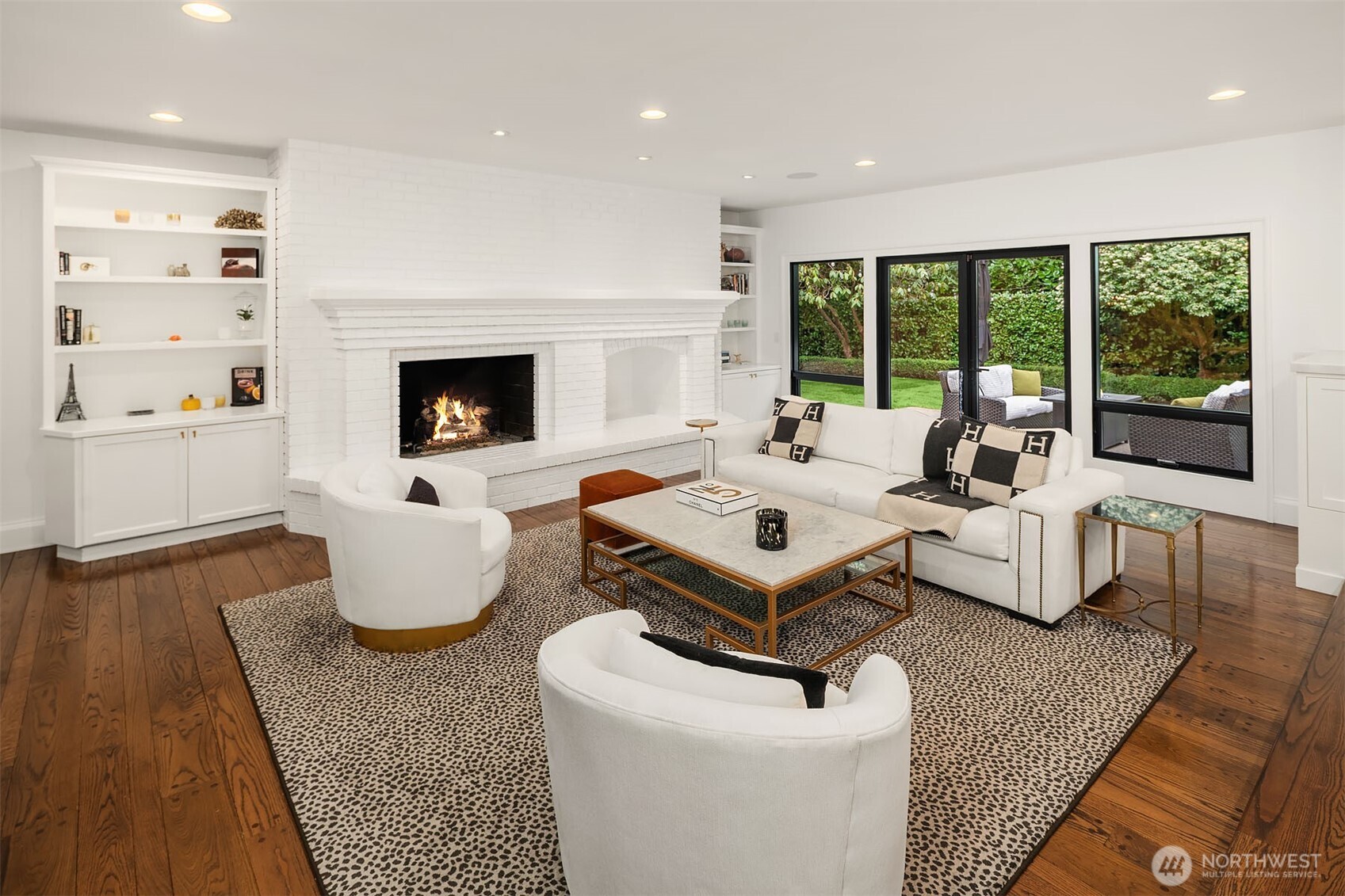 1601 Evergreen Point Road Medina, WA 98039 - Photo 14 of 40 a living room with furniture fireplace and large window