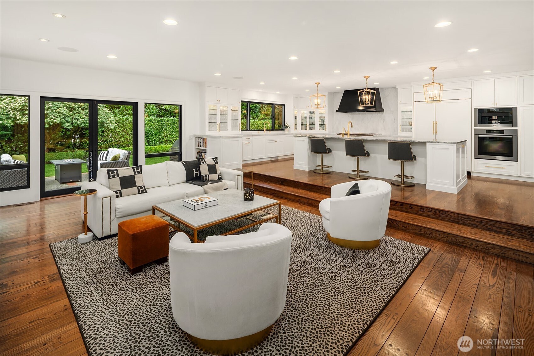 1601 Evergreen Point Road Medina, WA 98039 - Photo 15 of 40 a living room with furniture kitchen view and a large window
