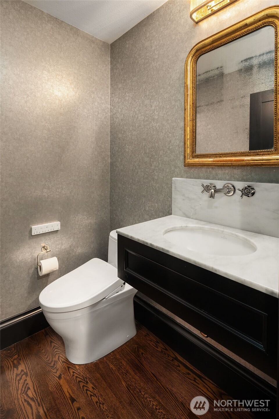 1601 Evergreen Point Road Medina, WA 98039 - Photo 16 of 40 a bathroom with a sink and a mirror