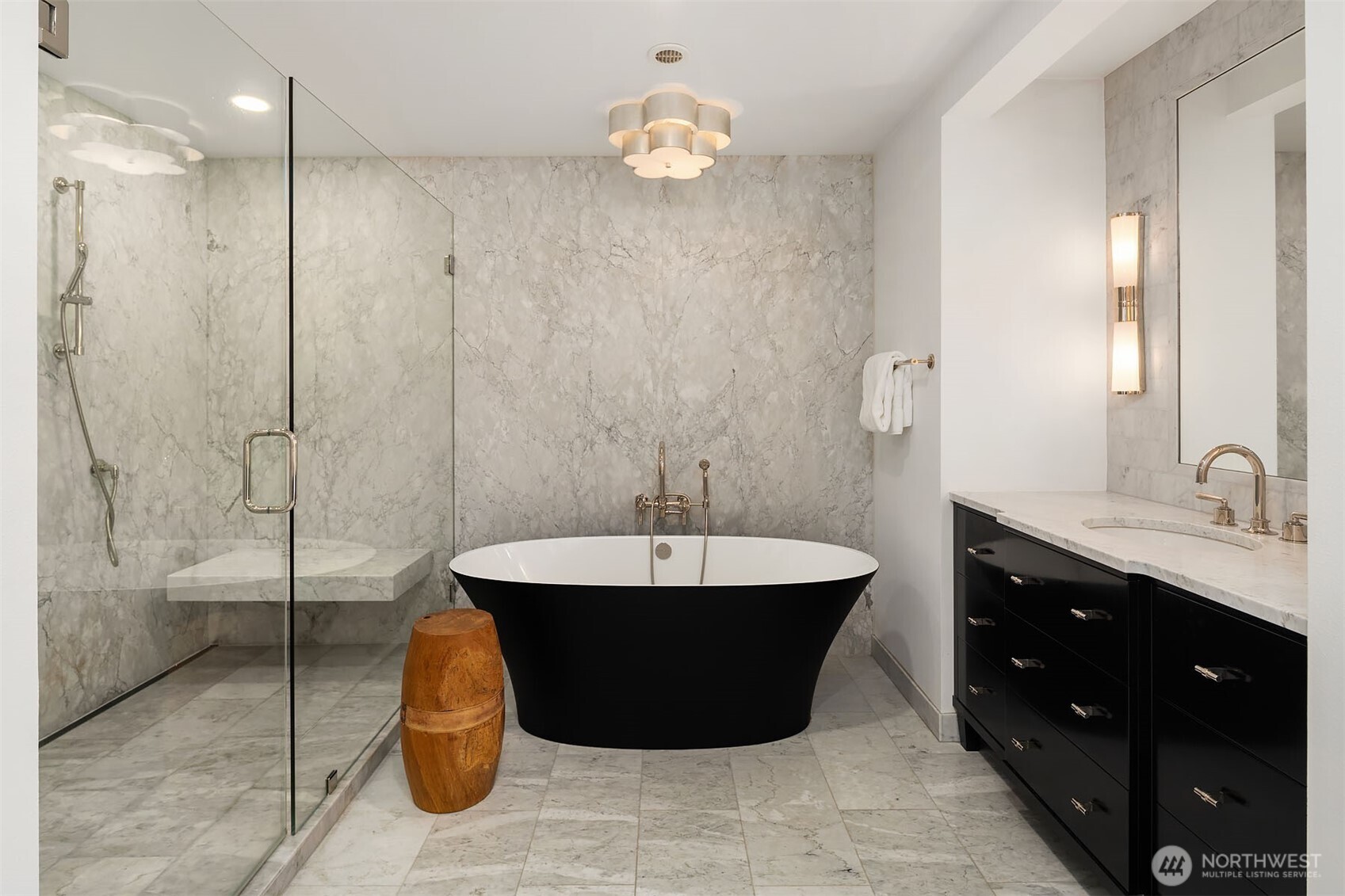 1601 Evergreen Point Road Medina, WA 98039 - Photo 19 of 40 a spacious bathroom with a sink a toilet and shower
