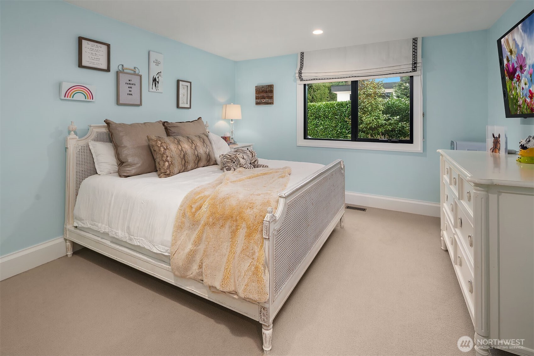 1601 Evergreen Point Road Medina, WA 98039 - Photo 23 of 40 a bed room with a bed and a large window