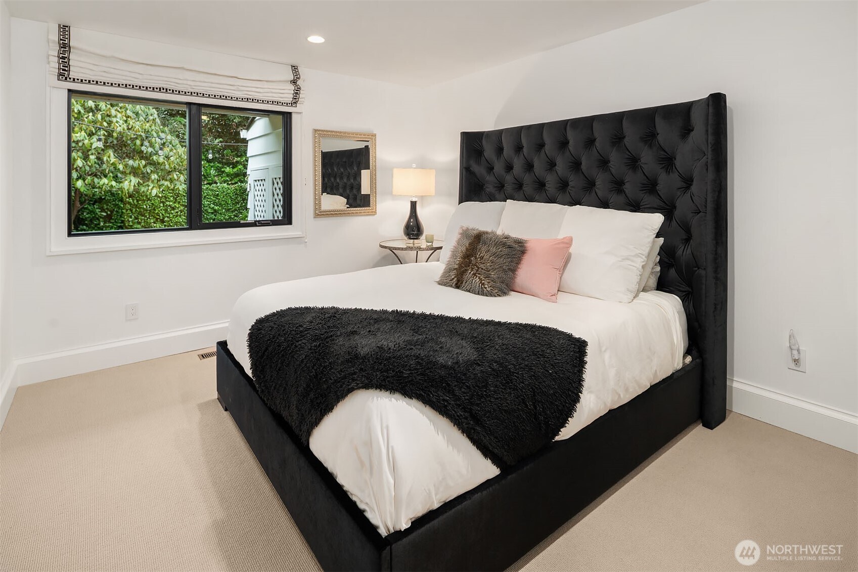 1601 Evergreen Point Road Medina, WA 98039 - Photo 24 of 40 a bedroom with a bed and window